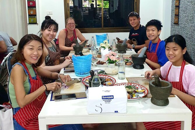 Phuket Thai Cooking Class with Market Tour Option - Grinding curry paste the traditional way