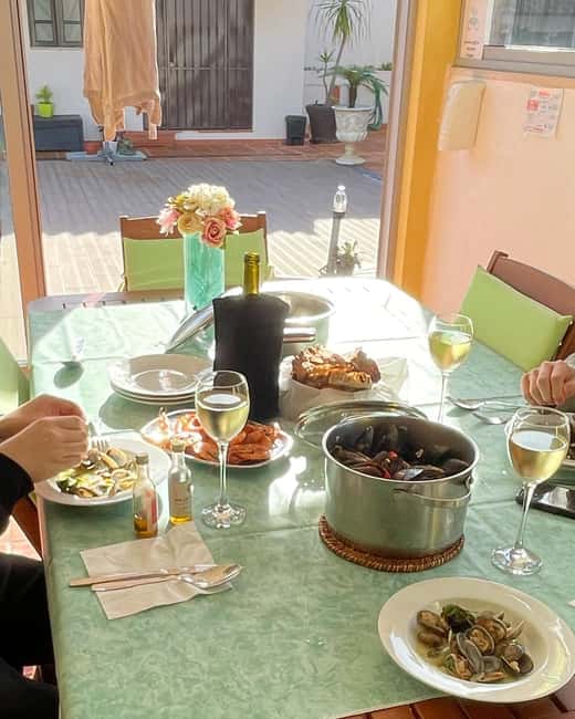 Porto: Coastal Villages Market & Seafood Cooking Tour - Cooking seafood in a coastal home