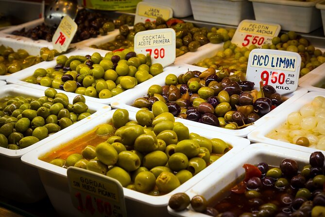 PREMIUM TAPAS TOUR: Paella, Market Tastings, and Winery - Atarazanas Market and the art of choosing ingredients