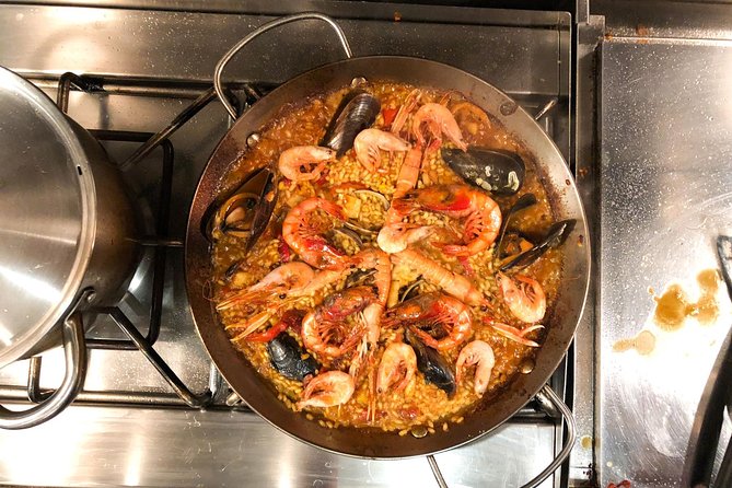 Private Barcelona Market Tour & Paella Cooking Class with Josh - Cooking paella from scratch