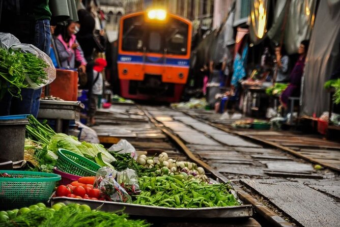 Private Damnoen Saduak and Maeklong Railway Market Tour(min 2pax) - What the English-speaking guide adds