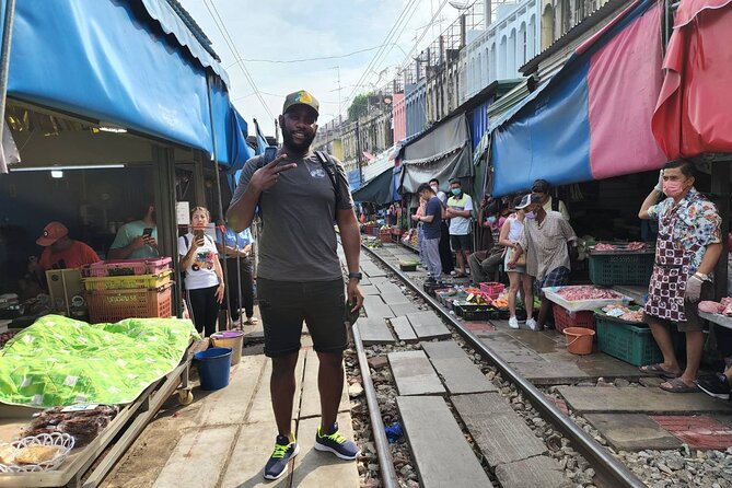 Private Floating Market and Maeklong Railway Market Day Tour - Maeklong Railway Market: where the train claims the aisle