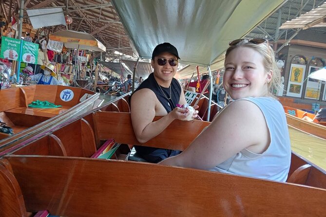 Private Floating Market and Maeklong Railway Tour from Bangkok - Taking a 30-minute boat ride at Damnoen Saduak
