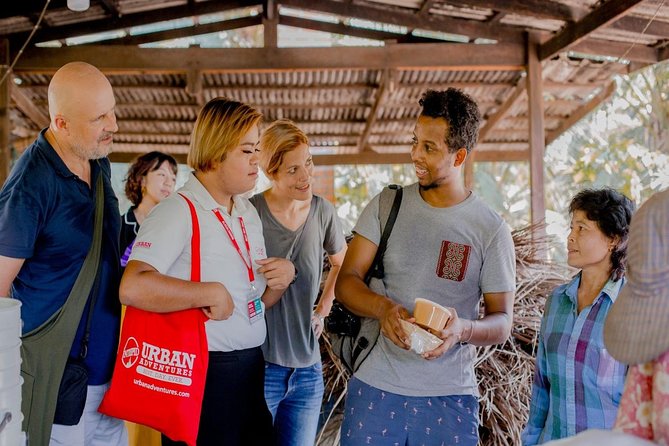 Private Tour from Bangkok: Railway and Floating Markets Tour - Reaching Damnoen Saduak by small boat