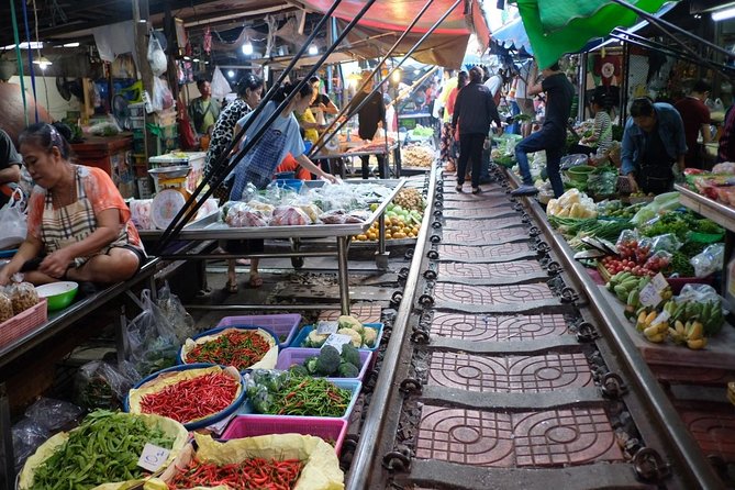 Private Tour from Bangkok: Railway and Floating Markets Tour - Walking, shopping, and tasting at the floating market