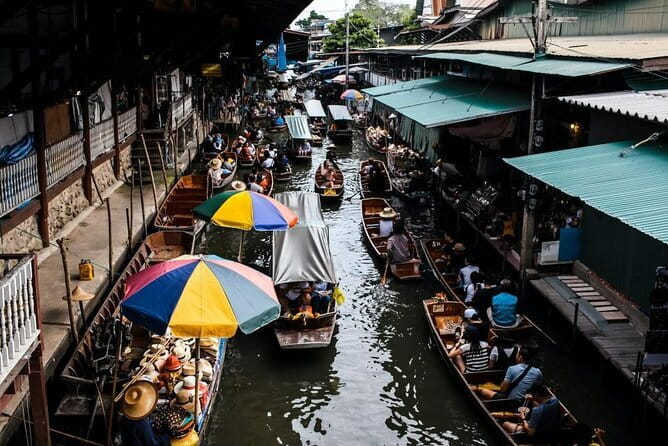 Private Tour to Maeklong Train Market and Floating Market - Watching the train pass through Maeklong