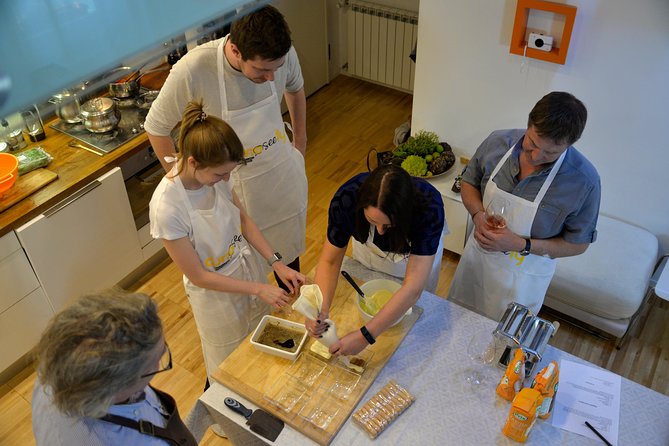 Rialto Market Tour with Hands on Cooking Class, Wine & Tiramisu - Preparing the main course with seasonal ingredients