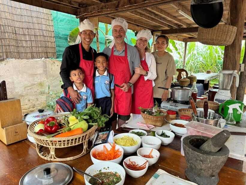 Siem Reap Khmer Cooking Class and Local Market Tour - Cooking traditional Khmer dishes with a local family