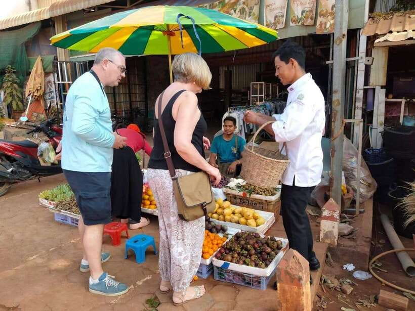 Siem Reap Khmer Cooking Class and Local Market Tour - Walking through a village market
