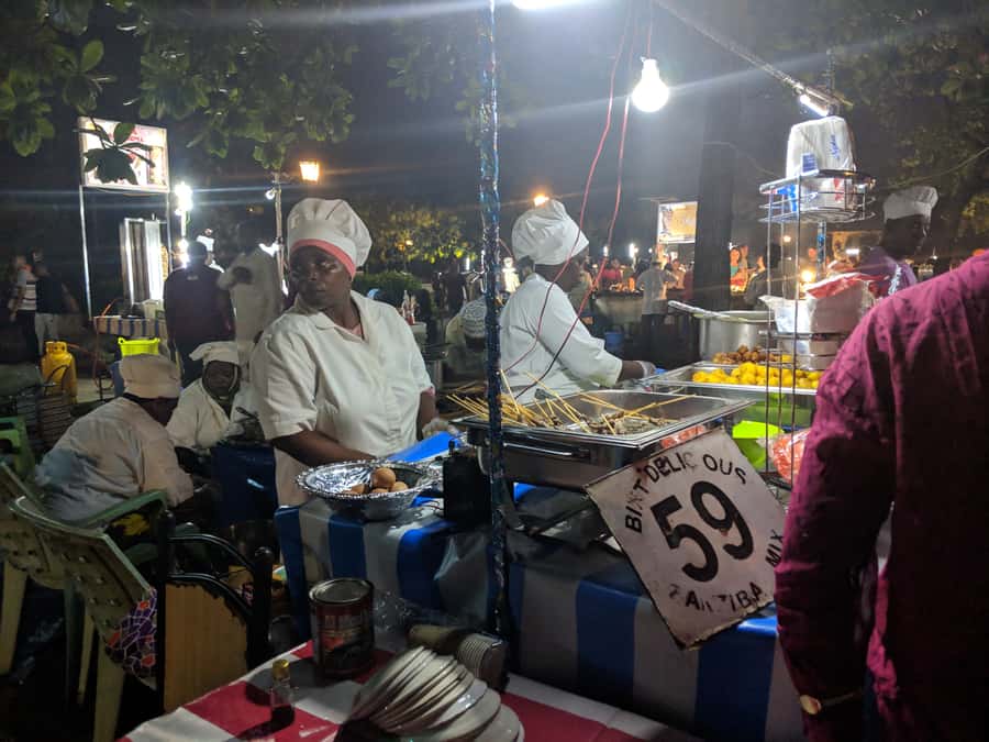 Stonetown: Food Markets and Street Food Walking Tour - Walking Stone Town after dark