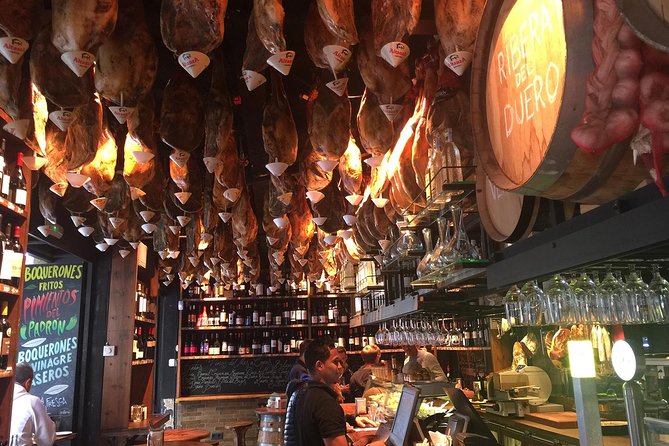Taste of Barcelona: Boqueria Market, Tapas & History Tour - Finishing in a 75-year-old Catalan tavern