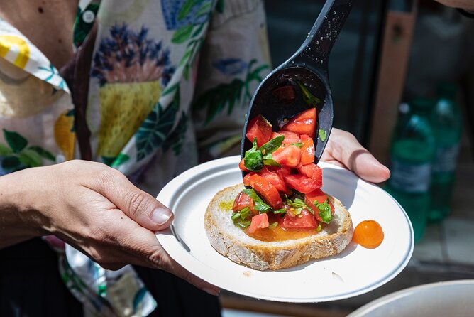 Taste of Testaccio: Special 15 Year Anniversary Edition - Making bruschetta at Testaccio Market