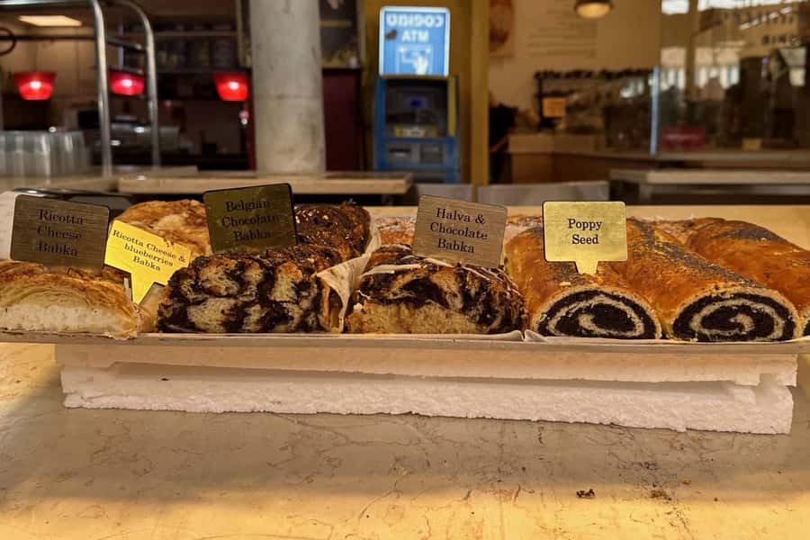Tel Aviv: Carmel Market & Neighborhood Guided Walking Tour - Spices, produce, bakeries, and the daily market rhythm