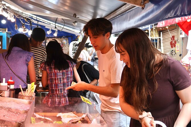 Tokyo: Private Tsukiji Fish Market Tour with 3 food stops - A quiet pause at Namiyoke Inari Jinja