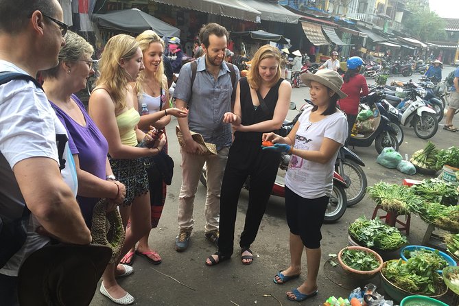 Traditional Cooking Class with Basket Boat Ride and market Tour - Cooking four Vietnamese dishes