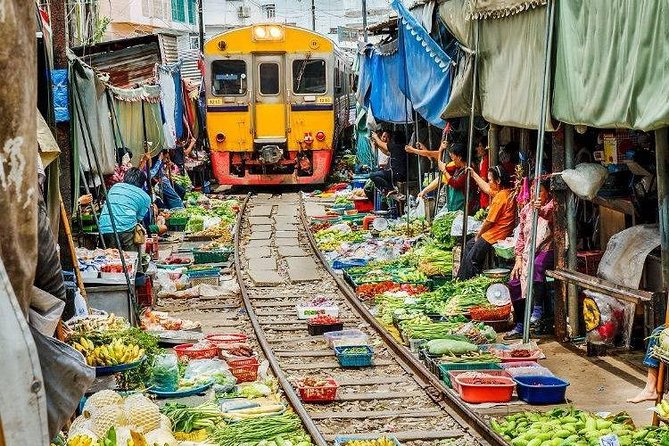 Train Market and Floating Market half day tour - Bargaining, food, and personal spending