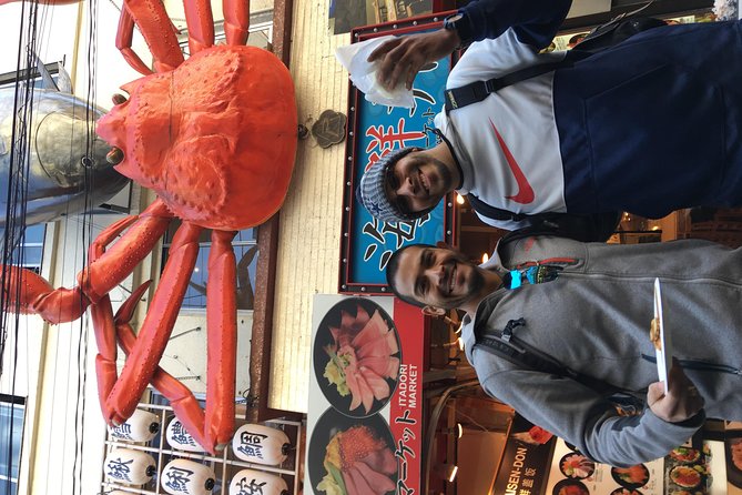Tsukiji Food and Toyosu Market with Government-Licensed Guide - Tsukiji Hongwanji Temple gives the tour a calmer finish