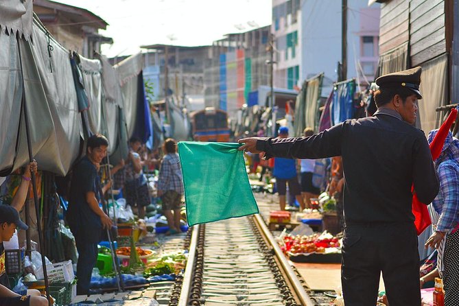 Unique Bangkok Markets: Train Market & Floating Market Adventure - Thai food, guided help, and what to budget