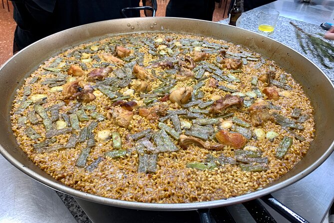 Valencian paella cooking class, tapas and visit to Ruzafa market. - The eight-minute walk to the cooking kitchen