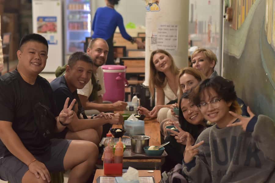 Weekend Hanoi Night Market & Street Food Tour - Banh mi, sticky rice with ice cream, and egg coffee